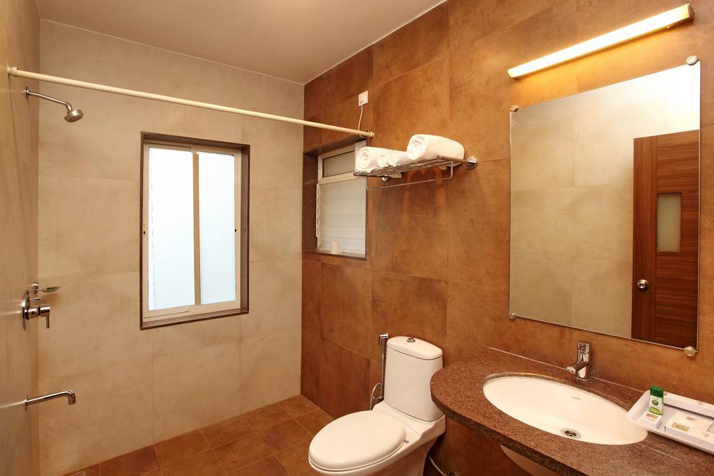 Athome Comforts Панаджі Номер фото